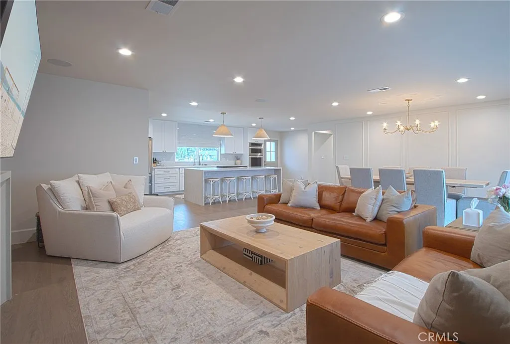 Open plan living, dining and kitchen at 13321 Bubbling Well Rd